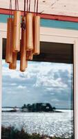 serene Coastal Reflection featuring Wind Chimes that create a calming ambiance video