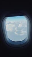 Stunning, beautiful clouds illuminated through an airplane window video