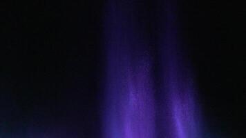 Purple Flame Fire Night Photography. Dark background, vertical, vibrant purple flame, likely gas, artistic visual. video
