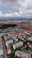Panoramic drone view of the city of Nice, France. The Cote d'Azur in the south of France. Limpia Port aerial view. Vertical video