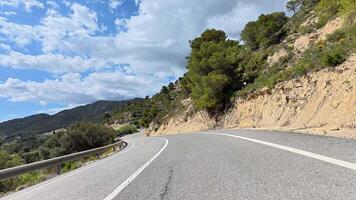 A stunningly beautiful winding road snakes through mountainous terrain, showcasing the incredible beauty of nature video