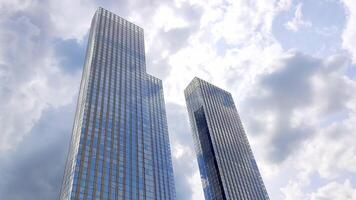 MOSCOW RUSSIA-JULY 2023. Tall glass modern skyscrapers -Capital Towers, against a cloudy sky with gray clouds video