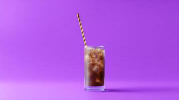 Iced Coffee in Glass with Gold Straw on Purple Background photo