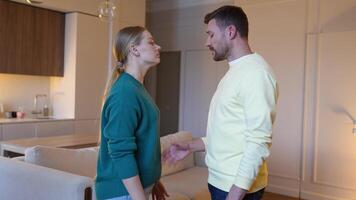 Angry disgusted wife push away husband, overwhelmed by deception. Trust shattered, heartbreak ensues video
