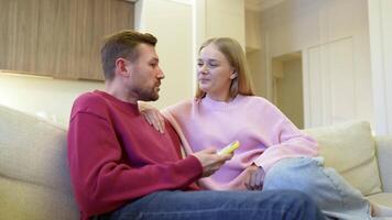 Loving flirting couple engages in passionate discussion, exchanging secrets and bond on first date video