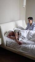 Stressful irritated woman wake snoring husband struggling to rest. Sleep deprivation, restless night video