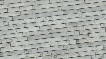 A close up of a wooden wall with a white paint video