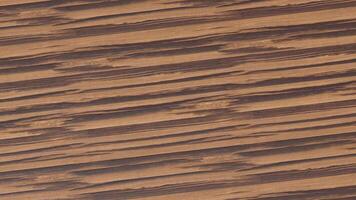 A close up of a wood panel with a brown stain video