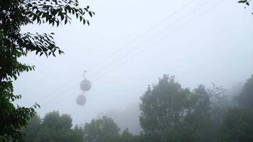 tourist mountain cable car line in fog in Kobe, Japan video