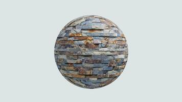A stone wall with a large stone ball in it video