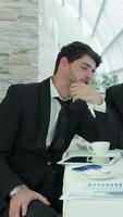 Dynamic businessmen engaging in a collaborative discussion video