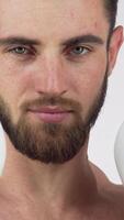 Confident bearded male boxer smiling in a dynamic fighting stance video