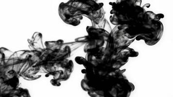 Ink dropping in water reveals smooth abstract motion on a clean white background creating unique patterns video