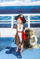 The scene is set on a boat, with a blue background photo