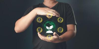 person hold icon to save energy,and reduce global warming,climate change,ecology friendly investment,ESG environment social governance,Green Business Innovation and Sustainable Development concepts photo