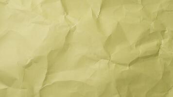 Wrinkled yellow paper animation. Crumpled texture in stop motion style. Ideal grunge background or textured cover loop. video