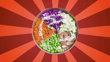 Top Down View of Shrimps Poke Bowl rotating on retro orange stripe background video