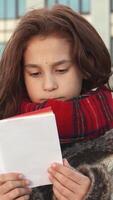 Upset girl struggles to navigate a map in a bustling city video