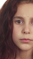 Curious girl gestures for silence with a playful expression video