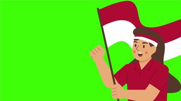 Flat of a young girl wearing headband holding Indonesian flag with proud face on green background video