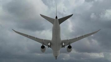 Passenger plane landing, cloudy sky video