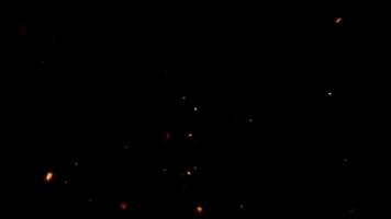 Beautiful Fire Embers and Particles Floating in the Dark Space Background With Red and Orange Color Scheme video