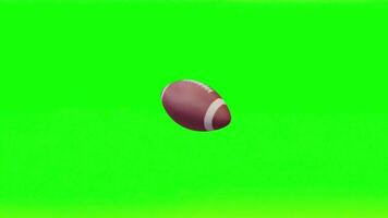 Football Ball Floating on Green Background in a Studio Setting with Smooth Texture and Brown And White Coloring for Sporting Events video