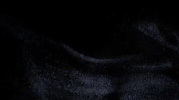 Abstract White Powder Dust Particles Floating in the Dark with Motion Wave Background for Creative Graphics and Design Element in Studio Shot video