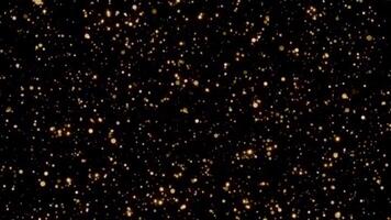 Golden Glitter Particles Sparkling on a Black Background for Festive Celebration and Elegant Luxury Design with Abstract Light and Bokeh Effects video
