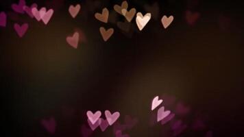 Pink and Purple Heart Bokeh on Dark Background video