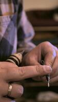A person is holding a pair of scissors video
