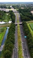 Aerial view of highway with cars driving on it video