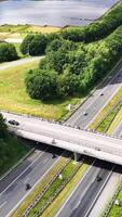 An aerial view of a highway with cars and trucks video