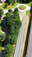 Aerial view of a highway with a roundabout video