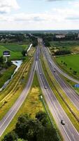 An aerial view of a highway with cars driving on it video