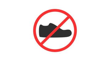 Sign prohibiting the use of shoes in a red circle. Shoe sign in a red circle. Shoe silhouette in a red circle. no shoes allowed. no shoes video