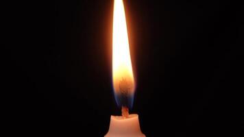 Flames of burning candles isolated on a black background. Concept holiday party, religious, memories. video