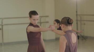 Introspective dancer sitting on polished floor video