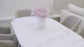 Modern dining room with a white table video