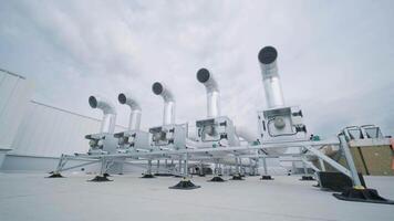 The air conditioning and ventilation system of a large industrial facility is located on the roof. It includes an air conditioner, smoke exhaust, and ventilation. 3 video