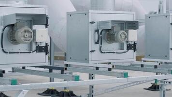 The air conditioning and ventilation system of a large industrial facility is located on the roof. It includes an air conditioner, smoke exhaust, and ventilation. 17 video