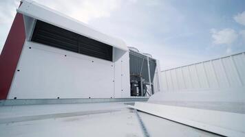 The air conditioning and ventilation system of a large industrial facility is located on the roof. It includes an air conditioner, smoke exhaust, and ventilation. 13 video