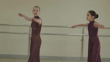 Dancers holding hands during expressive routine video