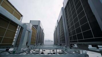 The air conditioning and ventilation system of a large industrial facility is located on the roof. It includes an air conditioner, smoke exhaust, and ventilation. 7 video