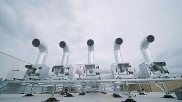 The air conditioning and ventilation system of a large industrial facility is located on the roof. It includes an air conditioner, smoke exhaust, and ventilation. 6 video