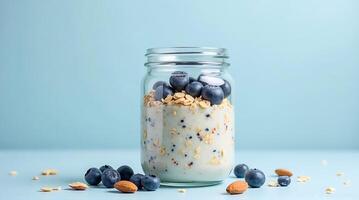 Delicious Overnight Oats with Blueberries and Almonds in a Glass Jar photo