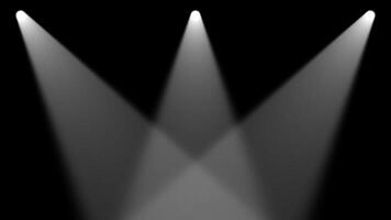 Three spotlight lights on a black background video