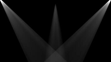 A black background with three spotlight beams video