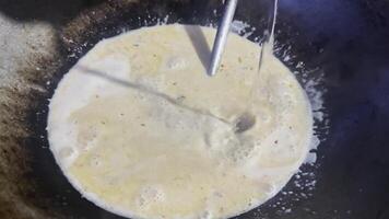 A pan with a white substance in it video