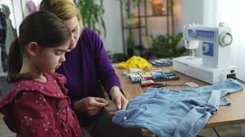 Crafting memories in a cozy sewing corner with mother and daughter video